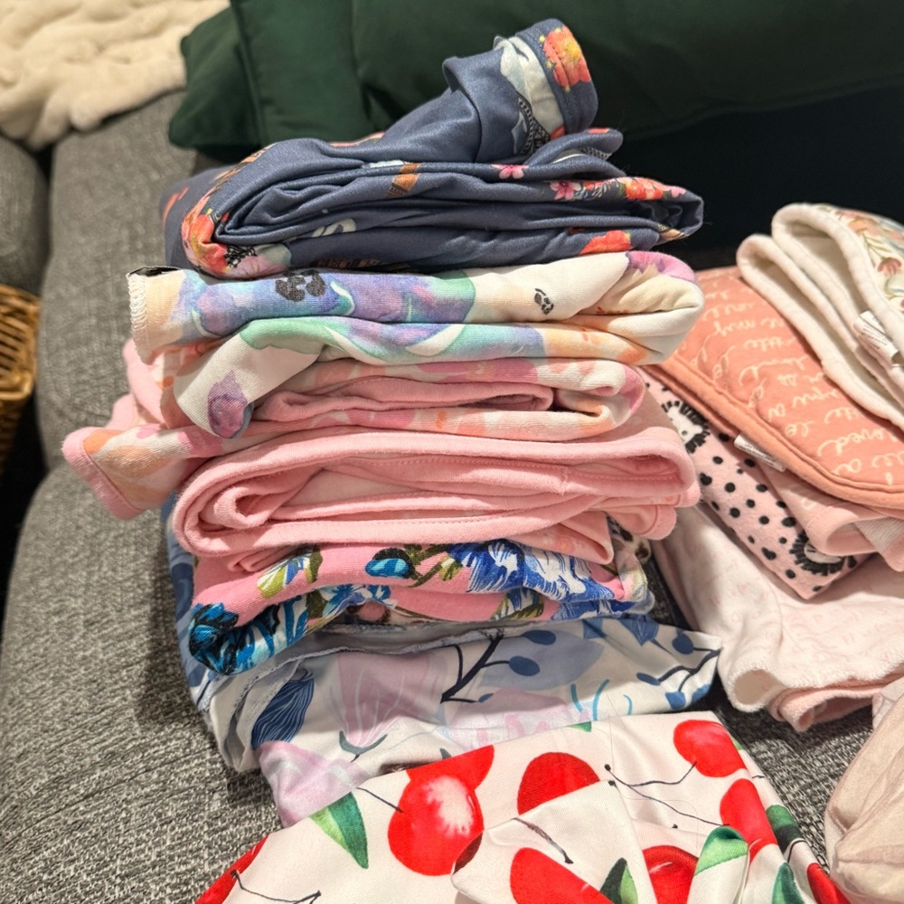Bundle of baby swaddling and receiving blankets